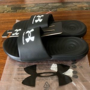 Men’s UA Ansa Fixed Slides Black. Comfortable and long-lasting slides.